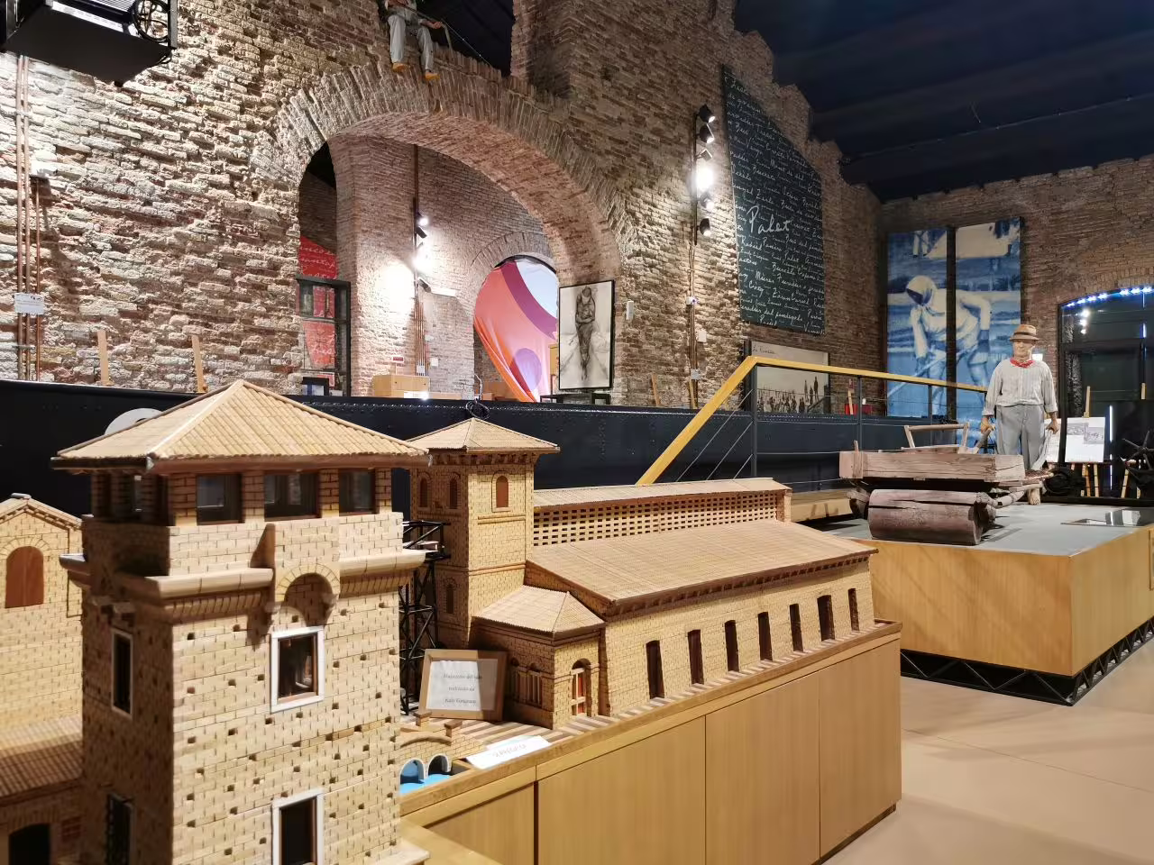 Exhibit of historical salt production models inside the Museum of Salt showcasing local heritage.