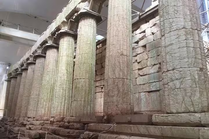 Ancient stone columns and walls at Mycenae archaeological site, highlight of 2-day private tour Delphi to Nafplion