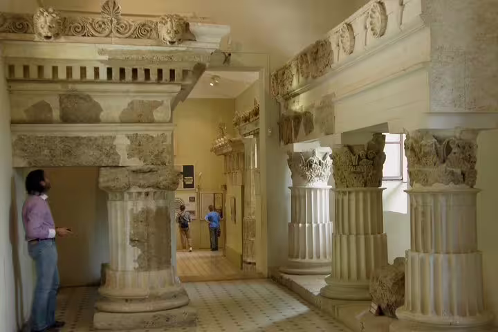 Archaeological museum hall with ancient columns near Mycenae, on Epidaurus Nafplio private tour from Athens