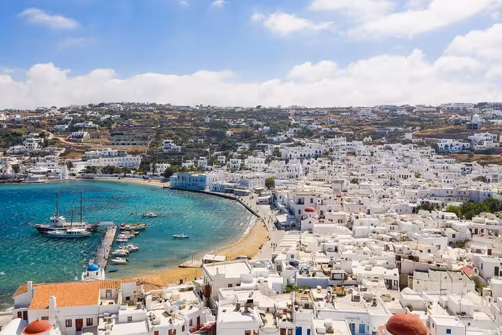 Panoramic view of Mykonos Town bay and whitewashed houses on a private full-day trip from Athens