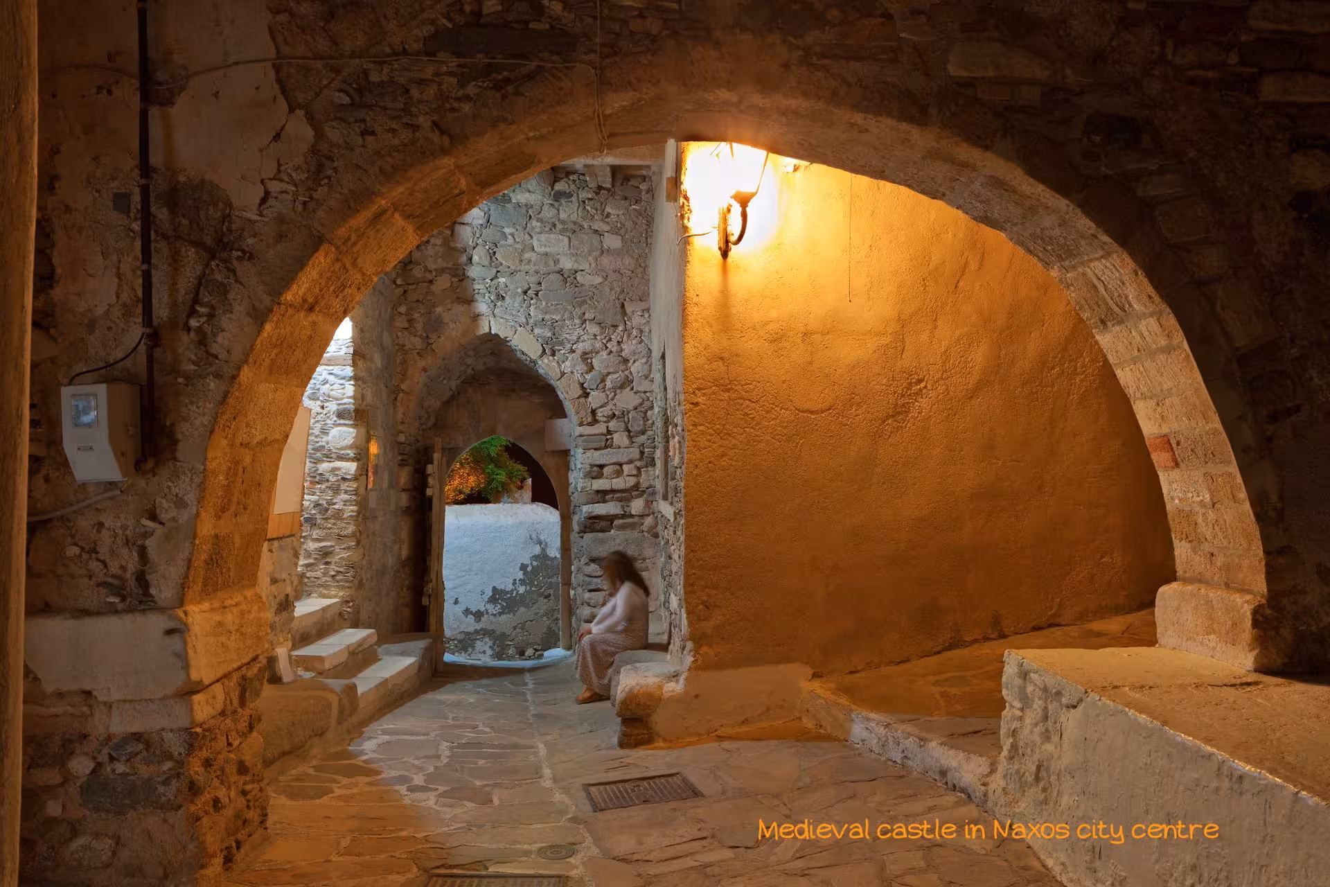 Stone archway in Naxos Castle old town, Cyclades Greece, a highlight on Athens to Santorini Naxos Mykonos tour