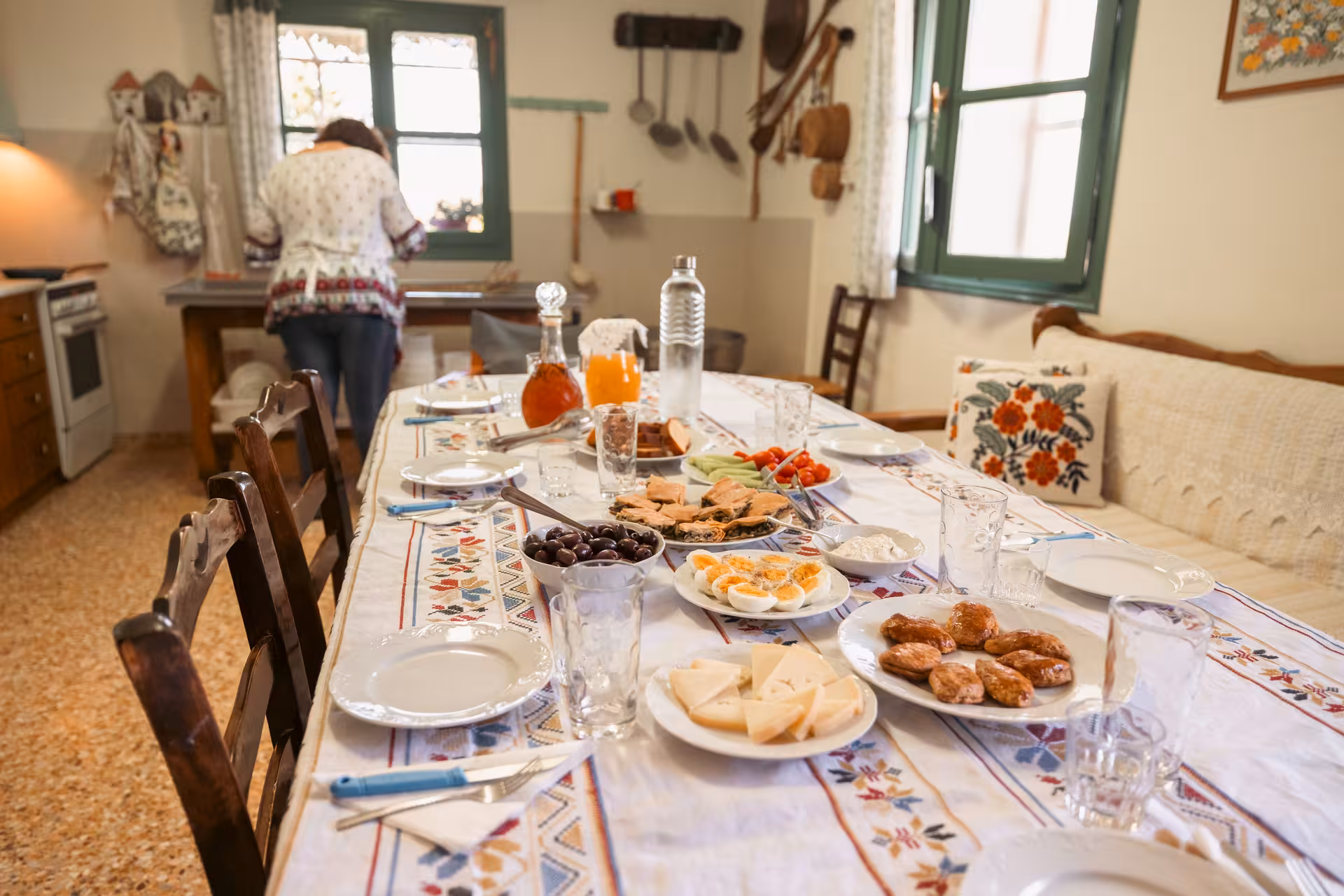 Traditional Naxos farmhouse table set with local cheese, olives and meze for a cheese and wine tasting