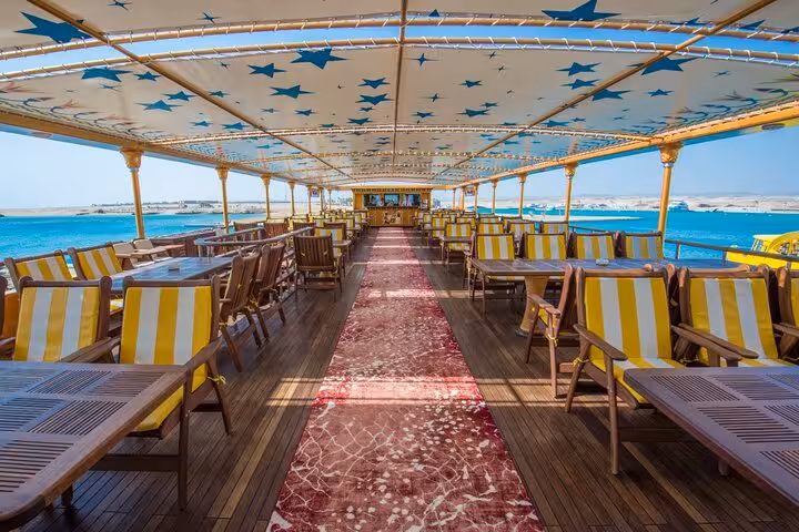 Open-air deck seating on Nefertari Cruise Marsa Alam, Red Sea boat tour with lunch/dinner and hotel pickup