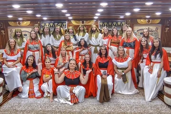 Guests in Ancient Egyptian costumes onboard Nefertari snorkeling cruise from Makadi, Red Sea day trip with pickup