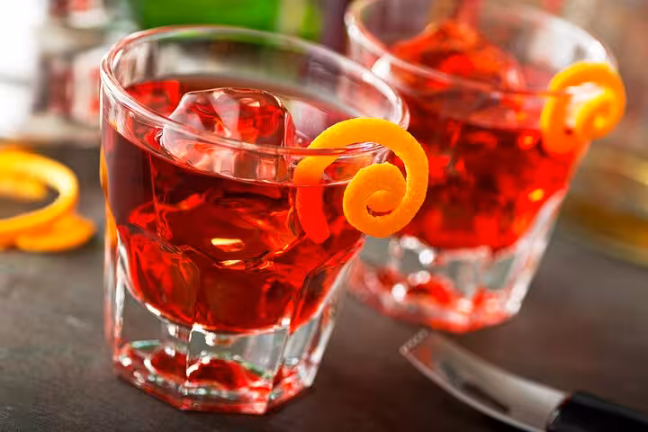 Refreshing Negroni cocktails with orange twist, part of the MaMa Florence Aperitivo Tour experience.