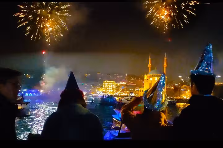 Fireworks over the Bosphorus on New Year's Eve party cruise Istanbul with skyline views and celebration