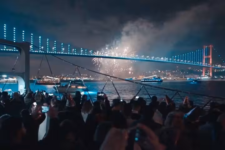 New Year’s Eve Bosphorus cruise Istanbul with fireworks view by 15 July Martyrs Bridge and party crowd
