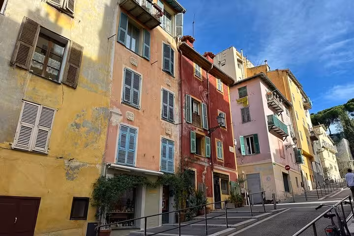 Colorful Old Town Nice facades and shutters, a scenic stop on a private driver tour from Cannes to Monaco