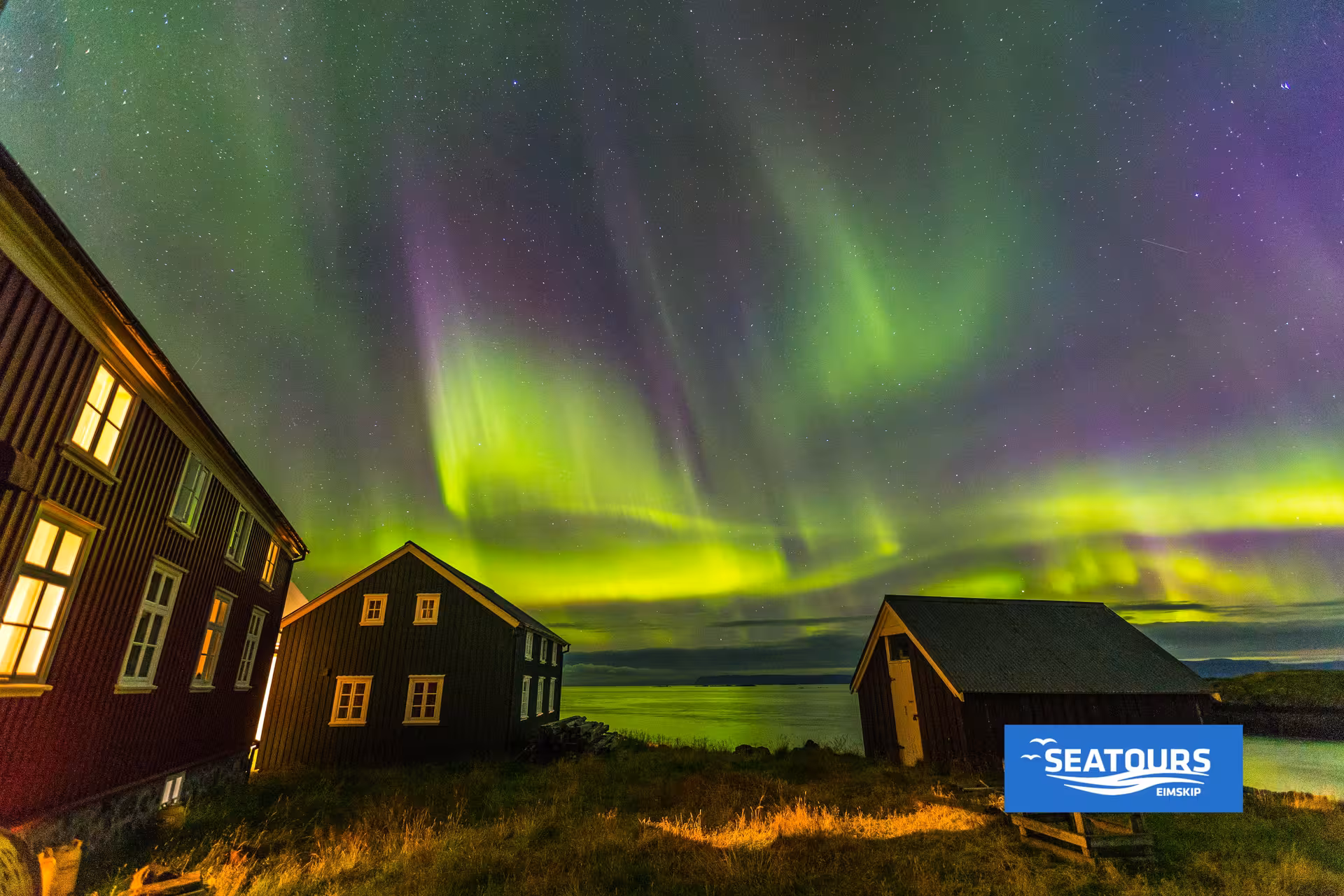 Northern Lights over Stykkishólmur harbour, a magical stop on the Stykkishólmur–Flatey–Brjánslækur ferry
