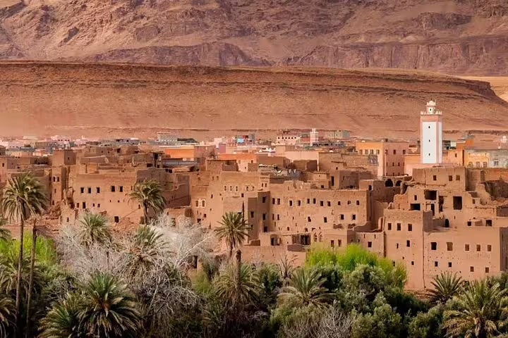 Oasis kasbah town with palms near Ouarzazate on a 3-day private desert tour from Marrakech to Fes