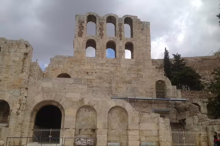 Ancient Odeon of Herodes Atticus ruins below the Acropolis, stop on a half-day Athens private city tour