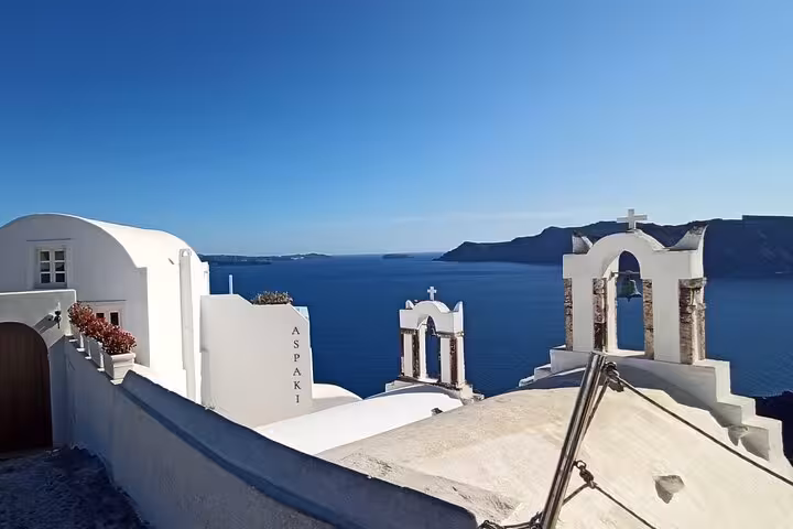 Oia Santorini church bell towers and caldera panorama, private 3-day island tour with transfers included