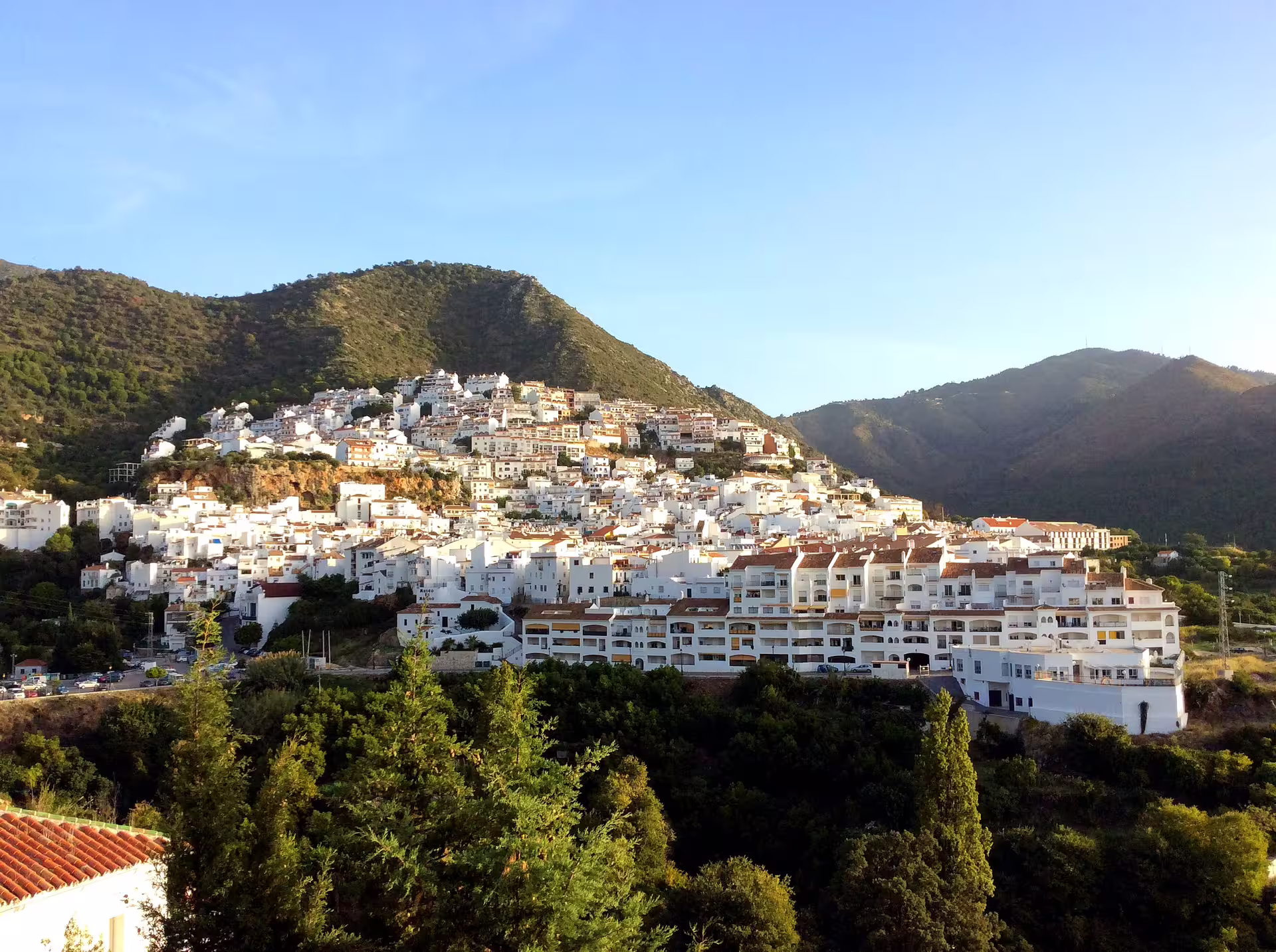 Panoramic view of whitewashed Ojen village in the Sierra de las Nieves, perfect for a private walking tour