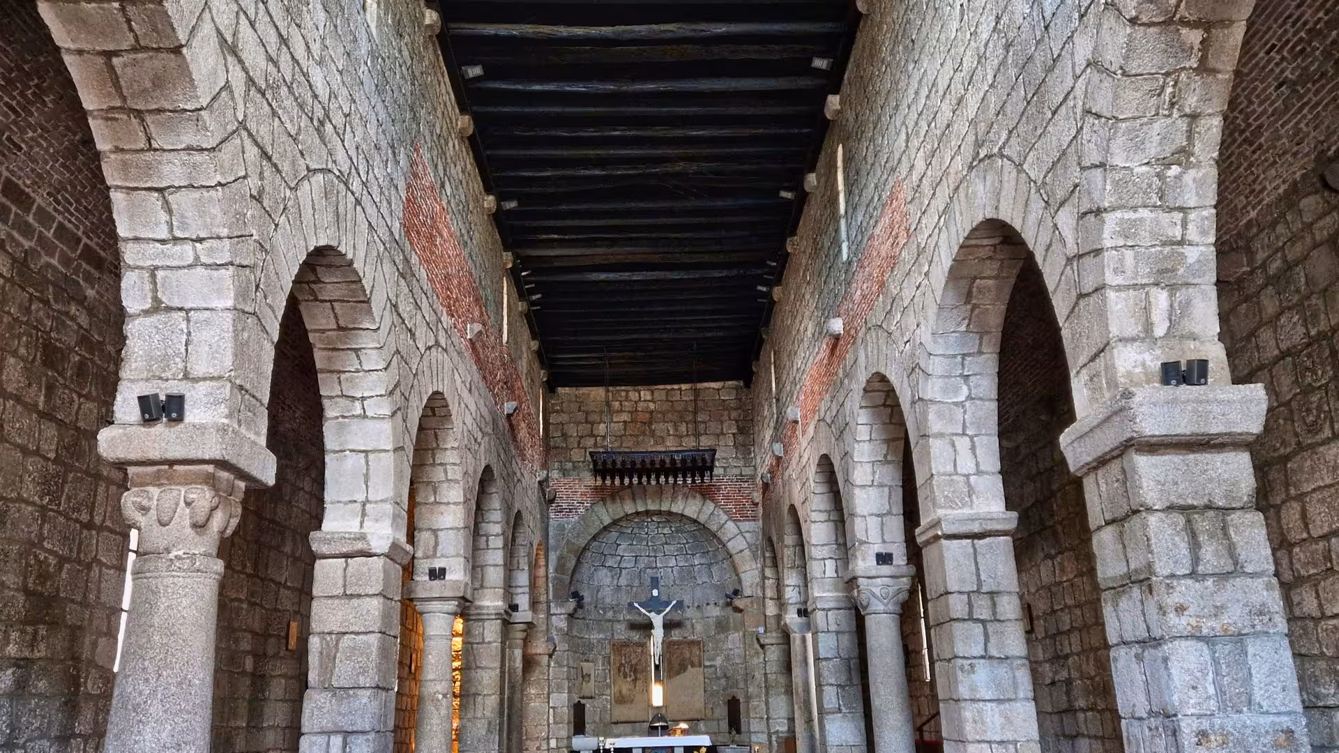 Discover the architectural beauty of a historic stone church interior on the Olbia archaeological tour.