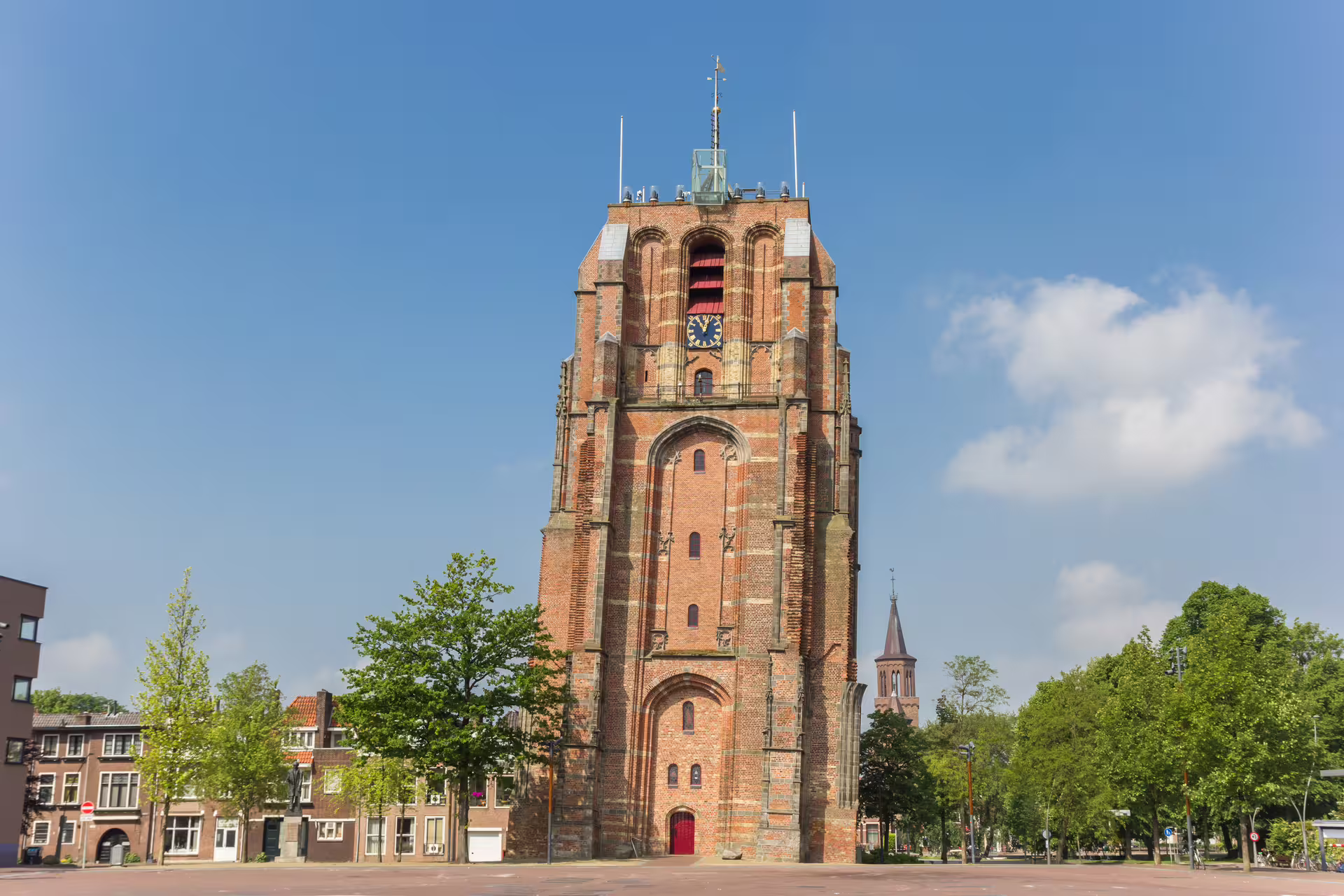 Oldehove leaning tower in Leeuwarden city center, key stop on 1-day walking tour with multilingual audioguide