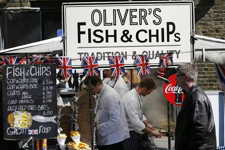 Oliver's Fish & Chips stall at Camden Market, showcasing traditional British street food with Union Jack decorations.