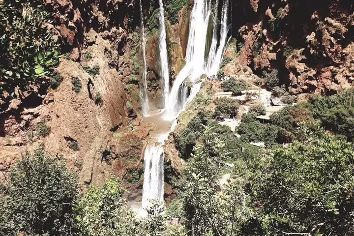 Panoramic view of multi-tier Ouzoud Waterfalls and trails, private day trip from Marrakech to Azilal