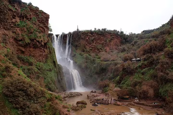 Ouzoud Waterfalls cascading into a river pool on a private day trip from Marrakech, Morocco