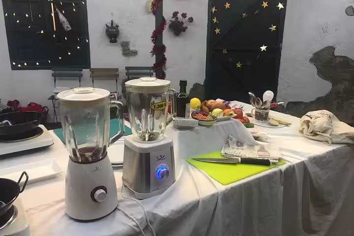 Blenders and fresh ingredients set up for a Paella and Salmorejo cooking class in Córdoba.