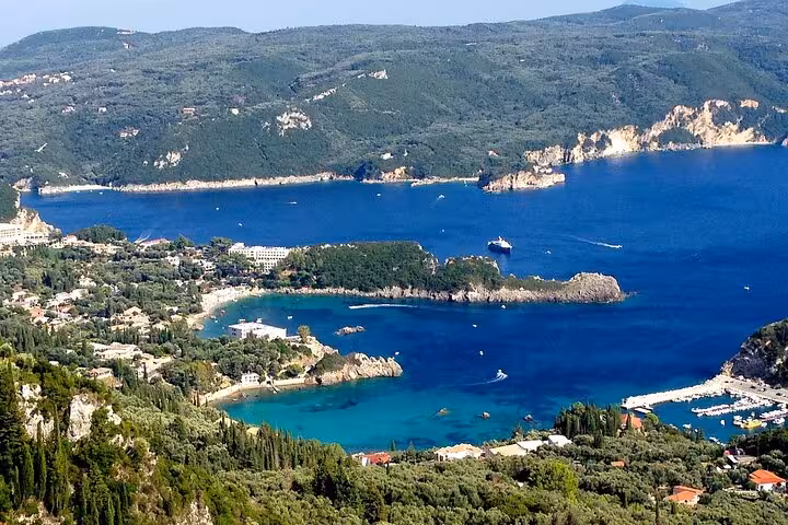 Panoramic view of Palaiokastritsa bay, Corfu island, turquoise sea and coastline on a private sightseeing tour