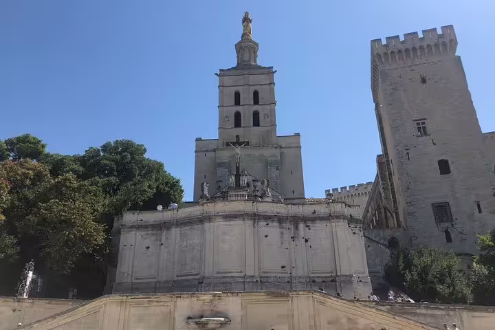 View of Palais des Papes in Avignon on a sunny day, landmark stop on a self-guided e-scavenger hunt