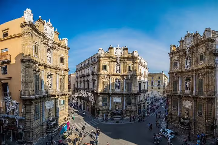 Quattro Canti baroque square in Palermo historic center, scenic route landmark on private transfer to Hotel Palazzo Sitano