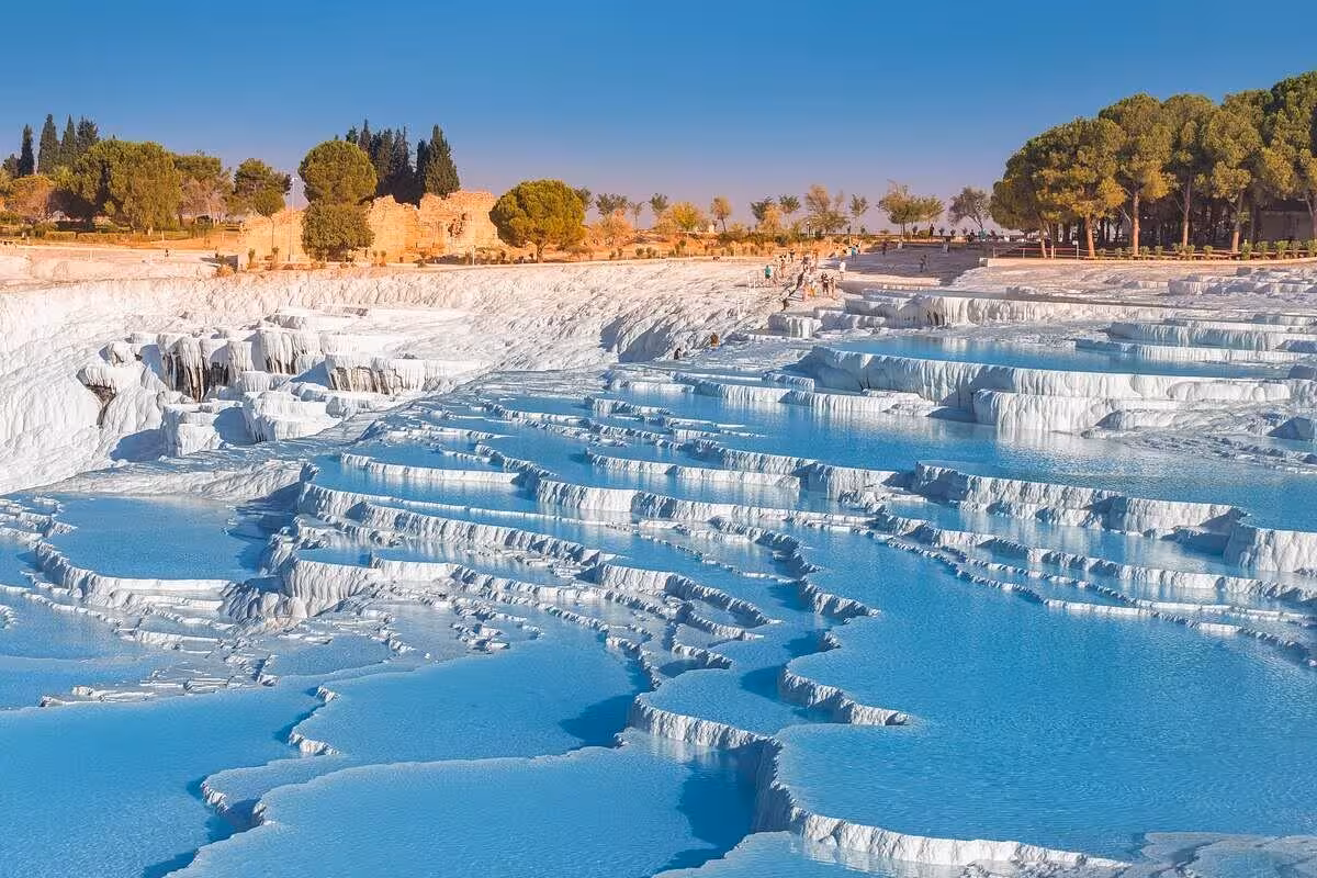 Panoramic Pamukkale cotton castle terraces and thermal pools, must-see stop on Ephesus Kusadasi tour