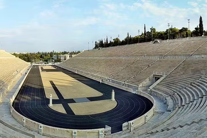 Panathenaic Stadium in Athens with running track and marble stands, highlight stop on fast city tour