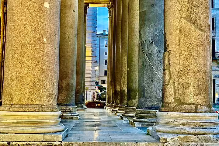 Close-up of ancient Pantheon columns at dusk visited on a Best of Rome by Night private chauffeured sightseeing tour