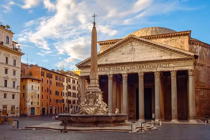 Daytime scene of the Pantheon in Rome with the iconic fountain, ideal for skip-the-line tickets and audio tours.