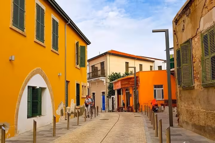 Colorful Paphos old town street on half day tour bus route with hotel pickup, Cyprus walking and photo stop