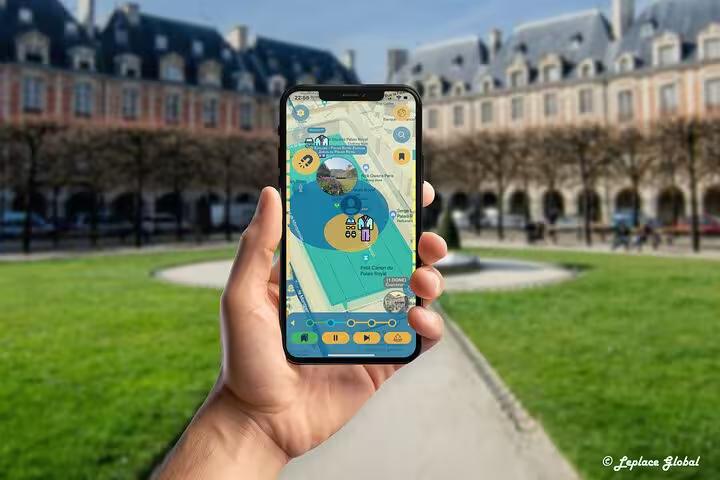 Explorer using Paris fashion history smartphone app at historic Place des Vosges during self-guided walking tour