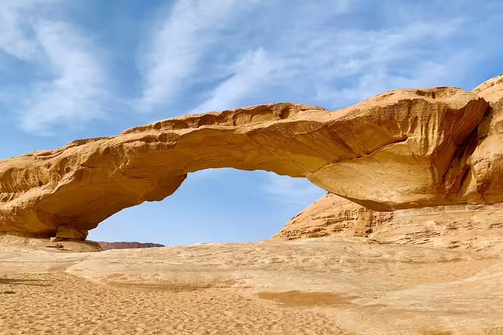 Natural sandstone arch near Petra, Jordan, a scenic stop on Petra tour from Taba by ferry boat