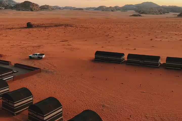 Desert camp at sunset, part of Petra tour from Taba by ferry boat with Jordan Wadi Rum stopover
