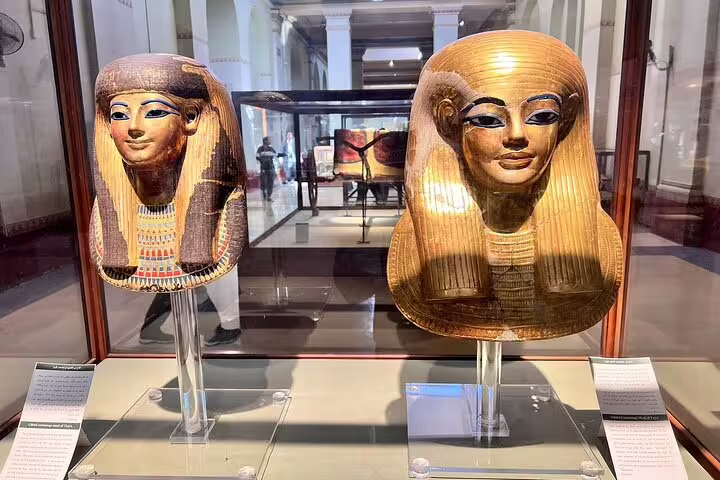 Golden Pharaoh funerary masks at the Egyptian Museum, Cairo stop on Pyramids of Giza day tour from Hurghada