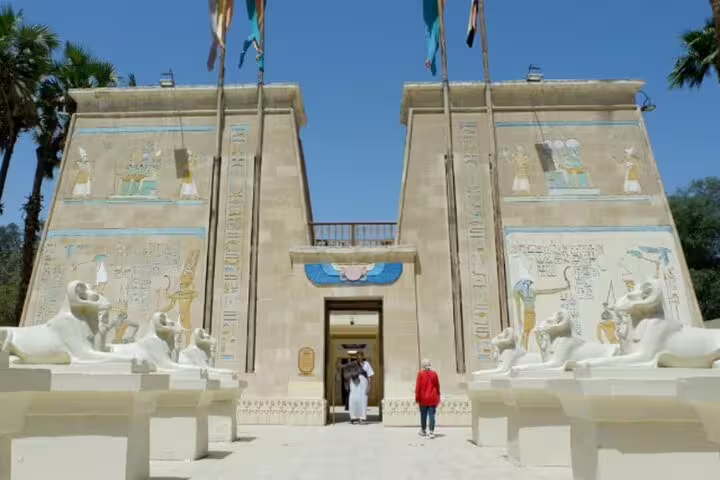 Temple-style entrance at Pharaonic Village Cairo with sphinx statues, ideal stop on a private guided tour