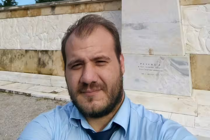 Traveler at Piraeus port area before Athens city centre transfer, convenient pickup from cruise terminal