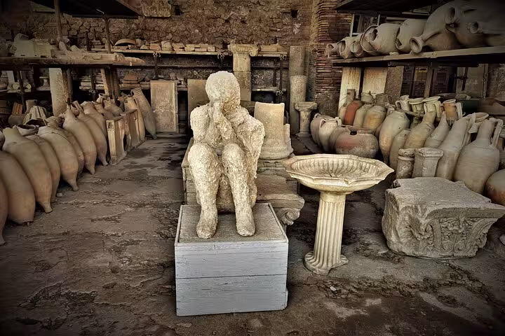 Discover preserved artifacts and a plaster cast of a victim at Pompeii on this insightful guided tour from Positano.