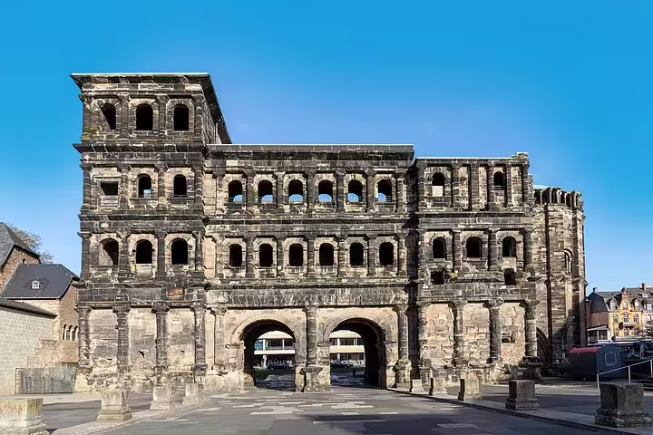 Porta Nigra in Trier, Germany, a highlight on the self-guided city walk with audio narration and GPS map