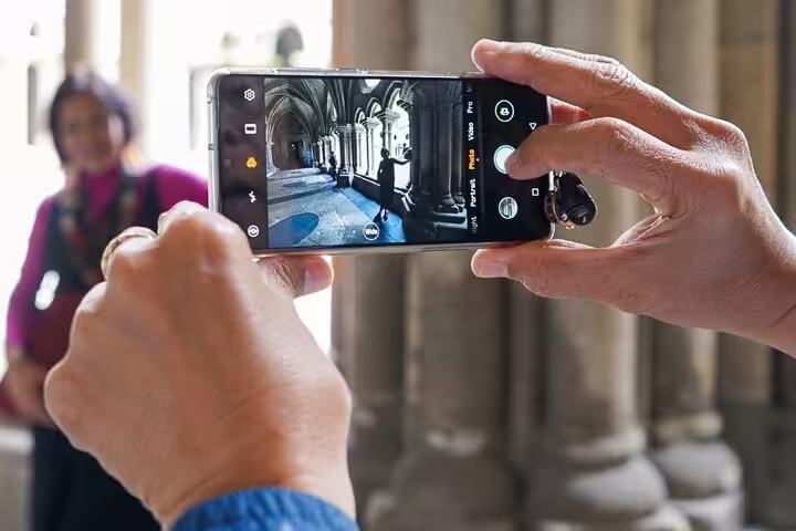 Capturing a picturesque moment inside a historic Porto cathedral during a private day trip from Lisbon, highlighting architectural beauty.