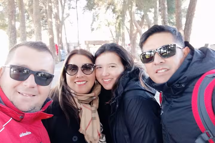 Happy cruise travelers with guide on private Ephesus tour from Kusadasi port, skip-the-line shore excursion