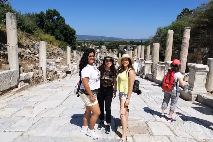 Friends on private Ephesus tour for cruisers on Curetes Street, ancient ruins walk with ticket included