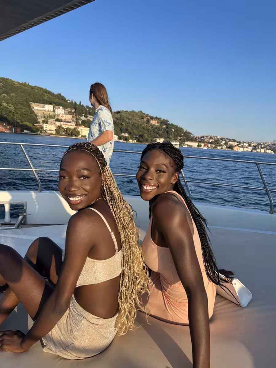 Friends relaxing on a private yacht on the Bosphorus in Istanbul, perfect for a swimming tour and cruise