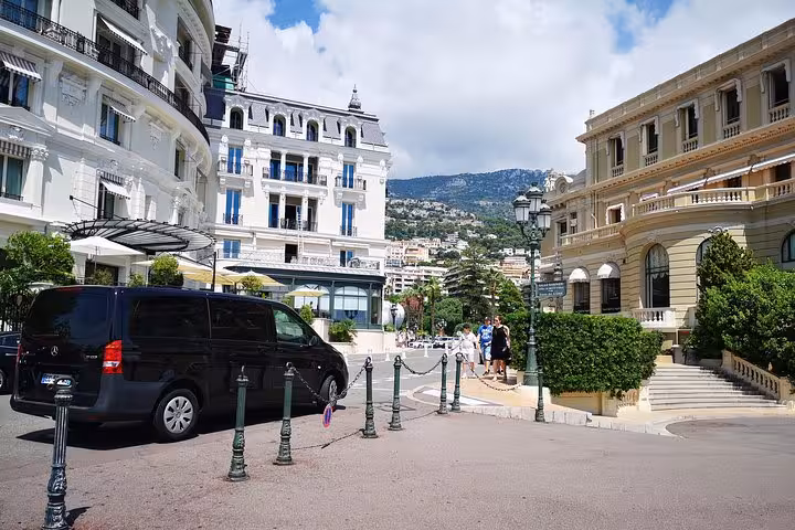 Private minivan near Monte Carlo Casino, Monaco, during a Half Day Eze and Monaco tour with scenic city views