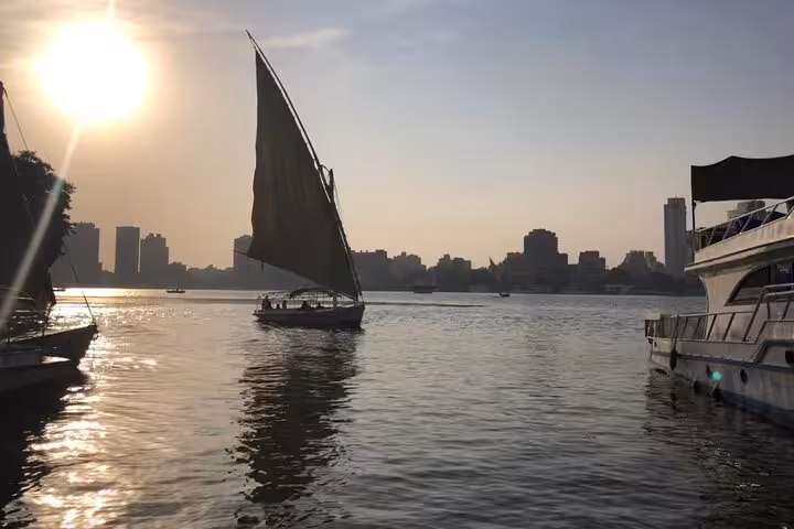 Sunset sailboat gliding on the Nile in Cairo, ideal for a private birthday cruise with lunch or dinner onboard