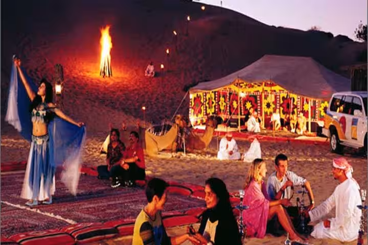 Bedouin-style desert night show near Luxor with belly dancer and campfire on private 7-day Nile cruise