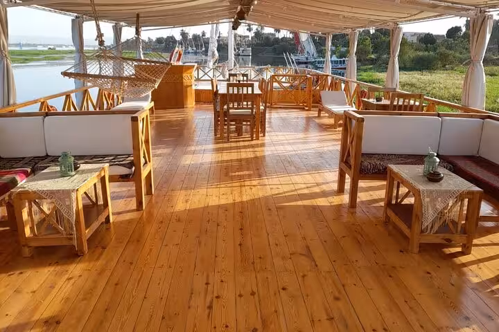 Shaded sun deck lounge on private Nile cruise ship, 7 days 6 nights Luxor to Aswan with river views