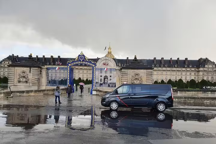 Private chauffeur van at Les Invalides in rainy Paris, half-day private sightseeing tour with driver and stops
