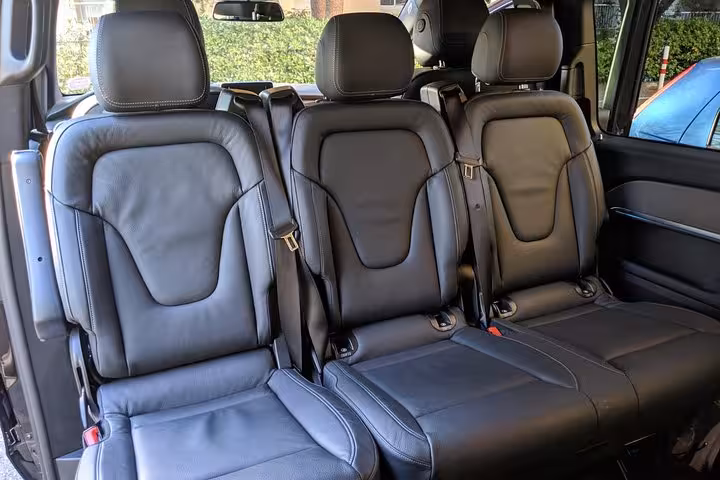 Spacious leather van seats for private transfer Marseille airport to port, hotel or train station