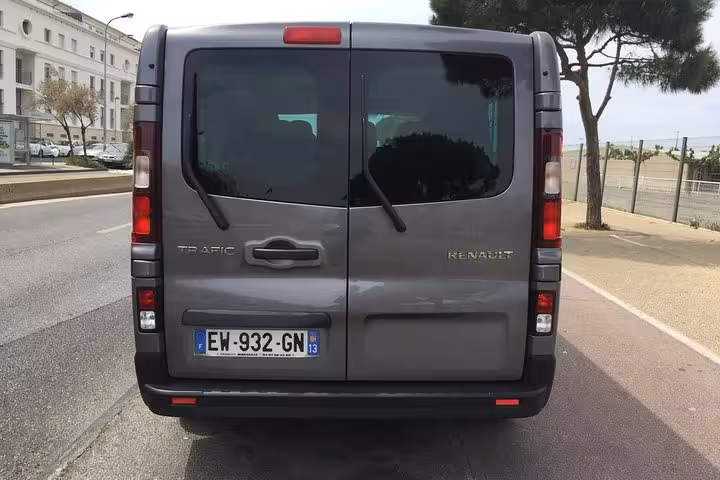 Rear view of Renault Trafic used for private transfer Marseille to Montpellier, reliable luggage-friendly vehicle
